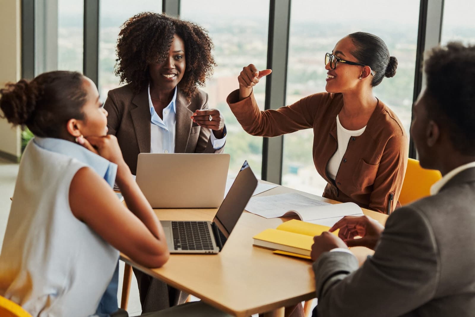 Professionals collaborating around a conference table